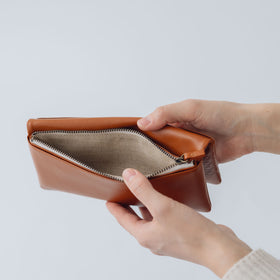 COSMIC WONDER monogram embossed light leather wallet