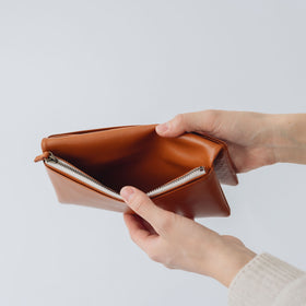 COSMIC WONDER monogram embossed light leather wallet