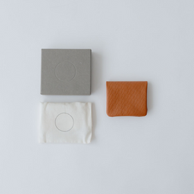 COSMIC WONDER monogram embossed light leather bifold coin case