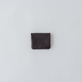 COSMIC WONDER monogram embossed light leather bifold coin case