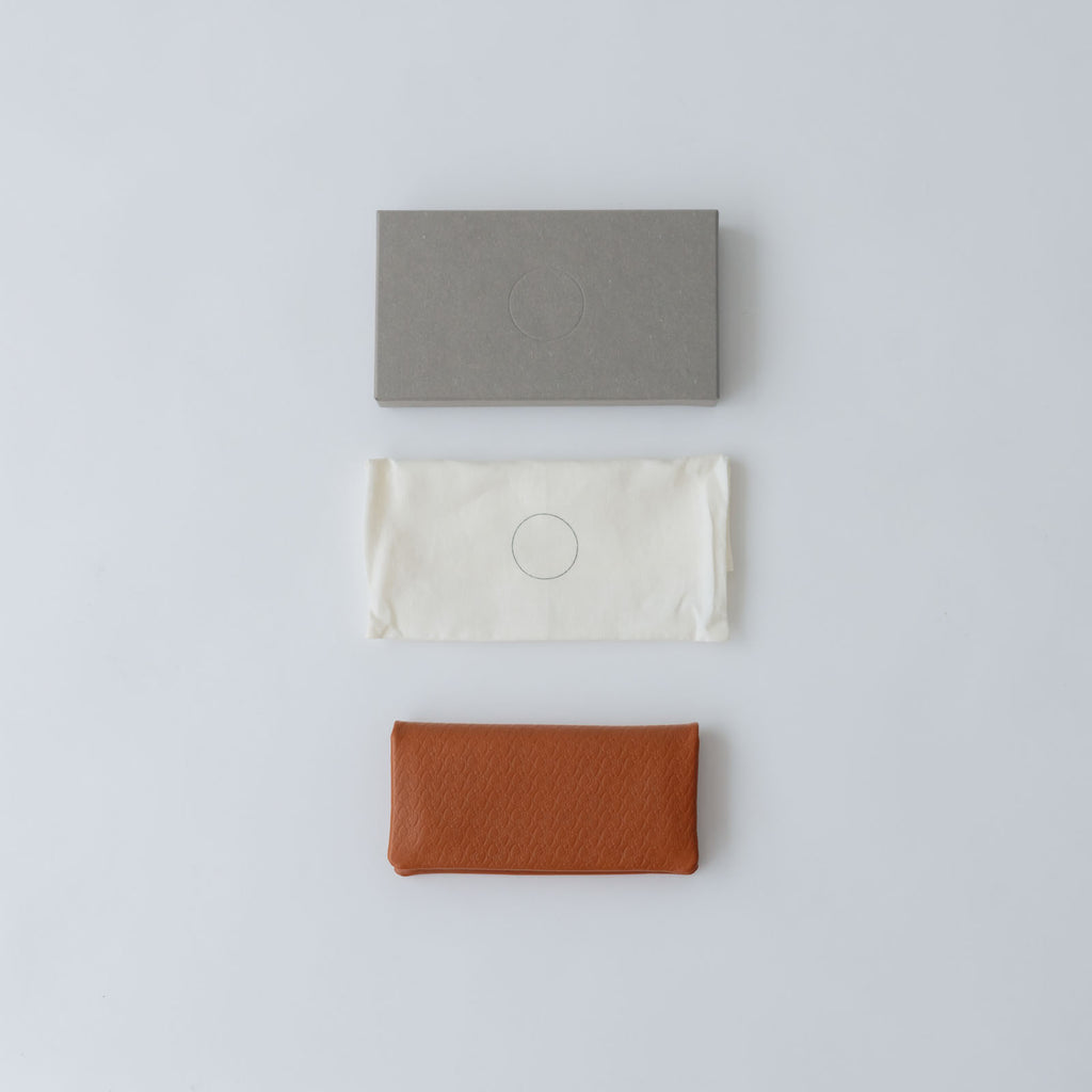 COSMIC WONDER monogram embossed light leather wallet