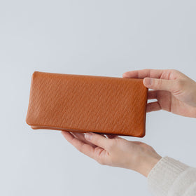COSMIC WONDER monogram embossed light leather wallet