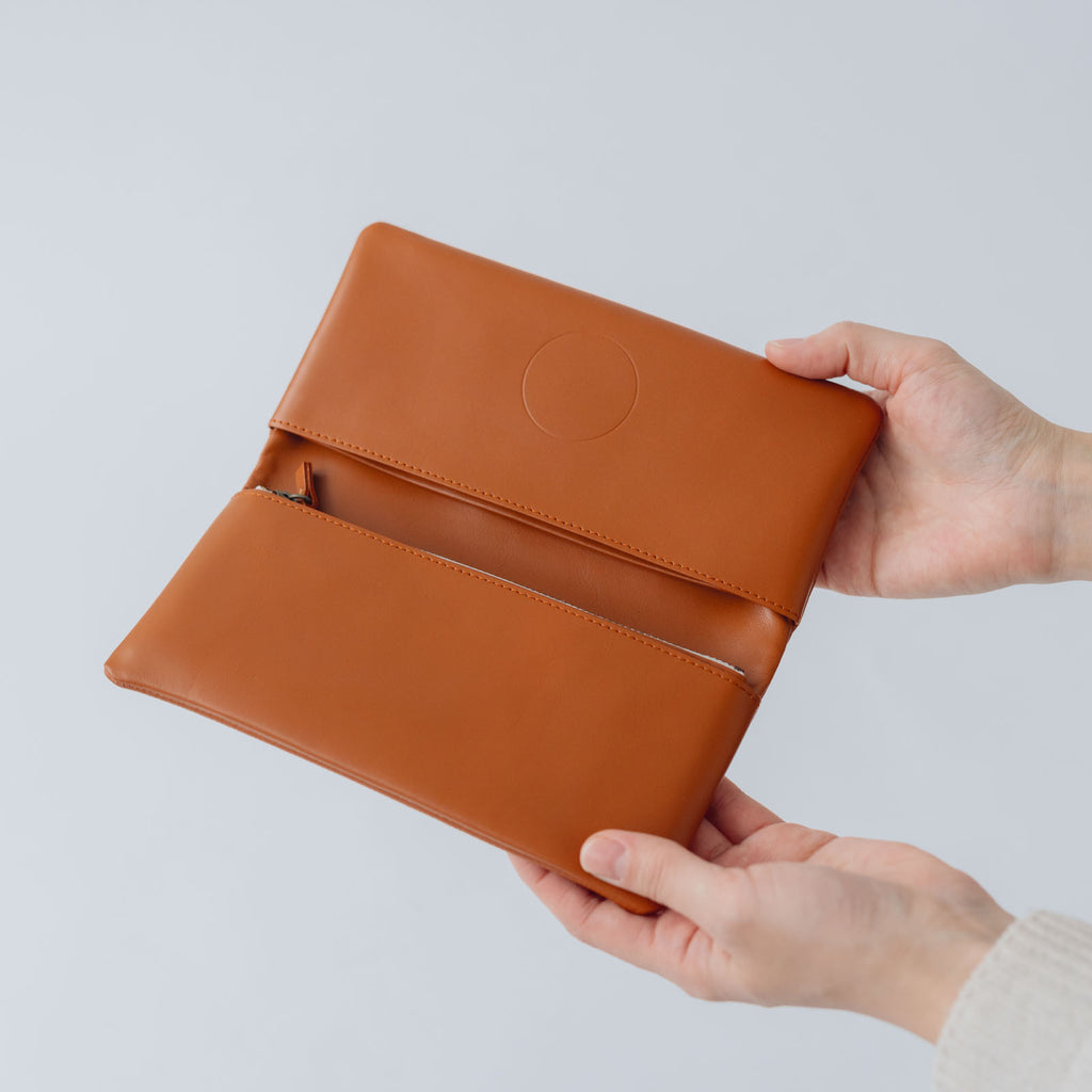 COSMIC WONDER monogram embossed light leather wallet