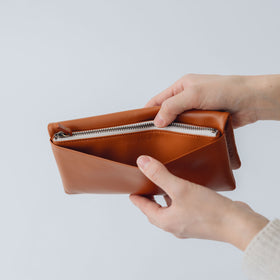 COSMIC WONDER monogram embossed light leather wallet