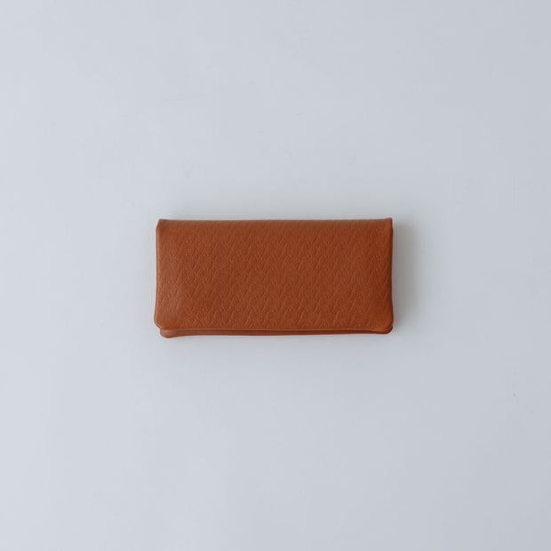COSMIC WONDER monogram embossed light leather wallet