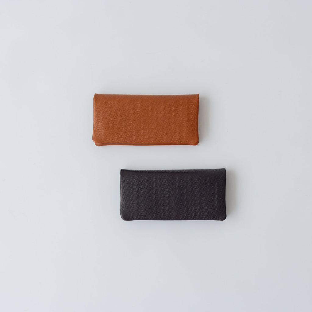 COSMIC WONDER monogram embossed light leather wallet