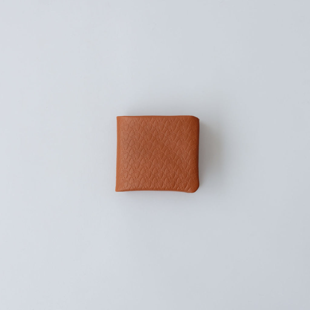 COSMIC WONDER monogram embossed light leather bifold wallet