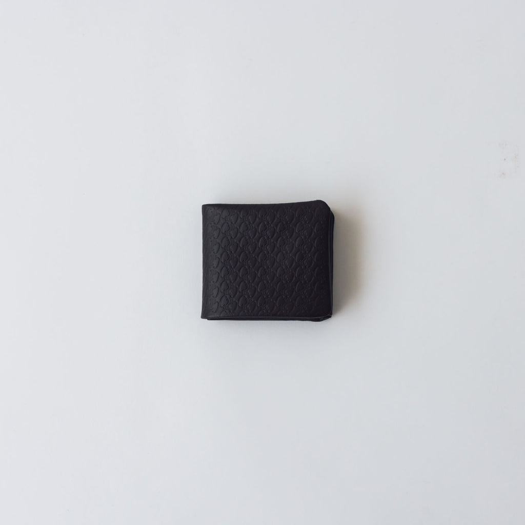 COSMIC WONDER monogram embossed light leather bifold wallet