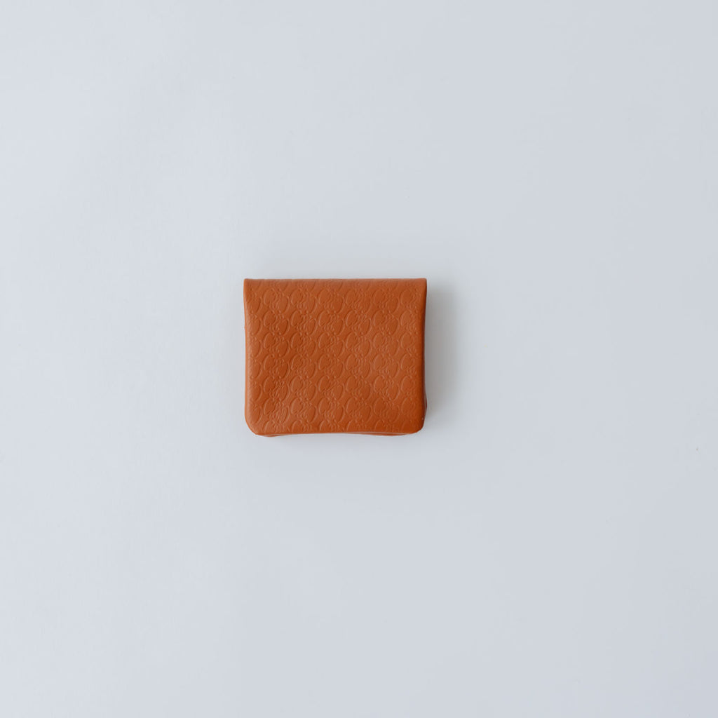 COSMIC WONDER monogram embossed light leather  bifold coin case