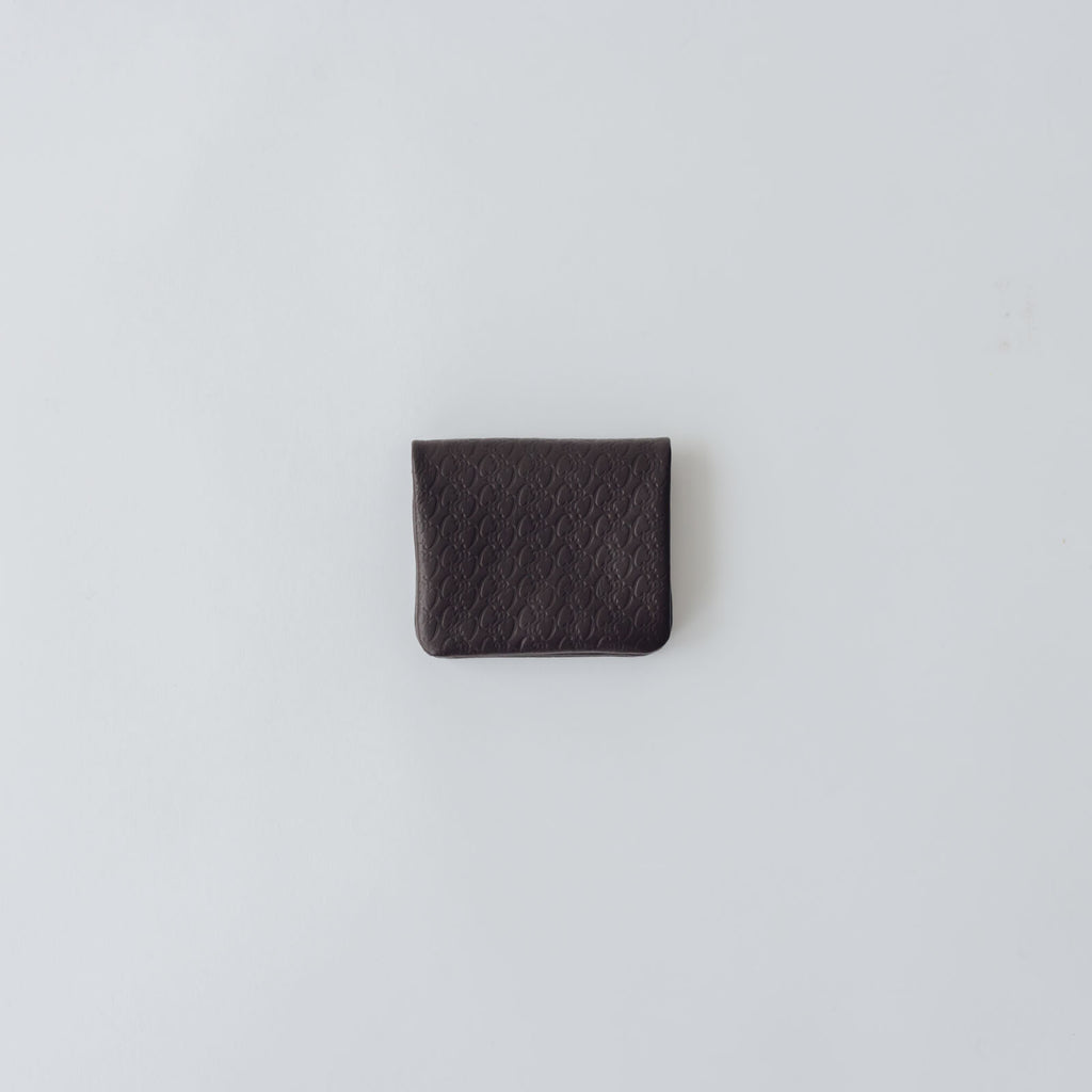 COSMIC WONDER monogram embossed light leather  bifold coin case